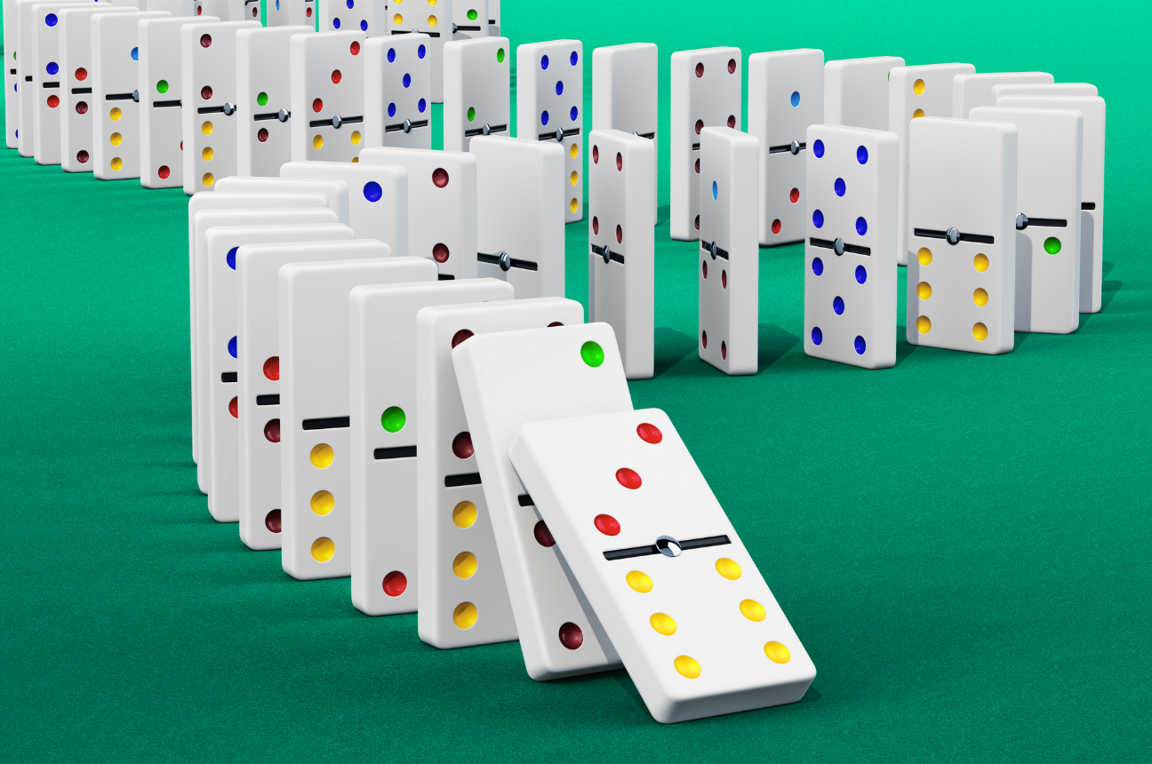 a line of dominoes representing how onboarding impacts talent acquisition metrics