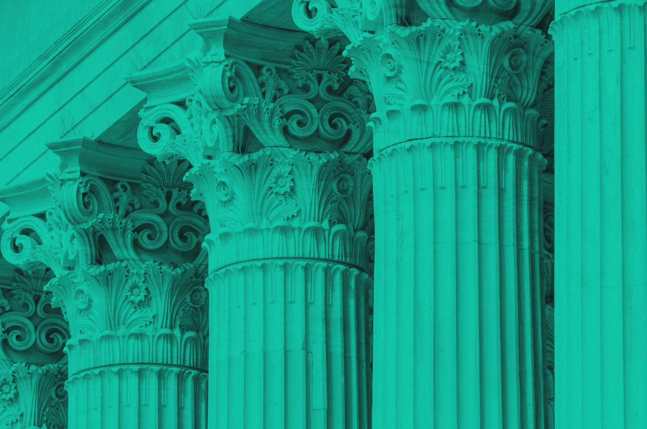 Pillars in a green filter to represent the 5 key pillars of effective DEIB strategies